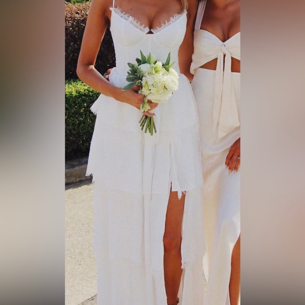 Elegant White Tiered V. Chapman Gown